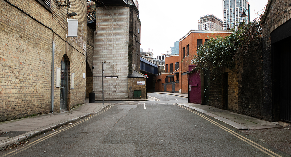 Clean city street after professional power sweeping services