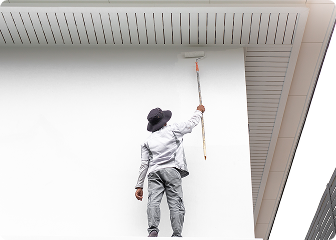 Commercial painter at work performing professional painting services